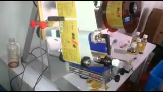 Machine détiquetage semiautomatique pour bouteilles Maroc [upl. by Erehpotsirhc]