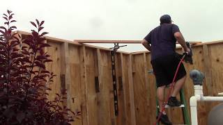 Raising The Shed Walls And Attaching To Concrete [upl. by Arhna]