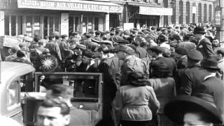 Group of American and British prisoners are marched through streets under German HD Stock Footage [upl. by Dorrahs631]