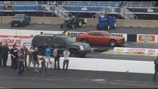 2014 GMC Yukon Denali vs 2010 Dodge Charger RT Daytona Drag Race [upl. by Cornelia]