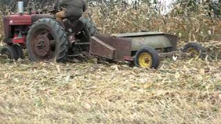 1941 Farmall M and Farmhand stalk chopper [upl. by Arriaes]