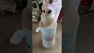 A woman is making a good earthenware pot [upl. by Amilah]