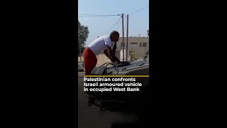 Palestinian confronts Israeli armoured vehicle in occupied West Bank  AJ shorts [upl. by Steinke]