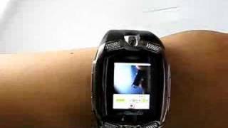 M810 M801 WATCH MOBILE PHONE CAMERA TRIBAND [upl. by Irama132]