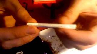 How to roll a cigarette  basic rolling [upl. by Farrow35]