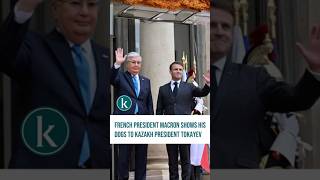 French President Macron shows his tazies to Kazakh President Tokayev [upl. by Zsazsa846]