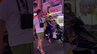 Watching motorbikes with 4 people while drinking beer on Bui Vien street Ho Chi Minh City [upl. by Ahsin557]