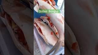 Putting some tomato at milkfish belly satisfyingvideo foryou asmr grilledbangus [upl. by Yrneh]