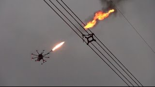 Flame Throwing Drone Helps Remove Net on UHV Power Line [upl. by Htebazil]