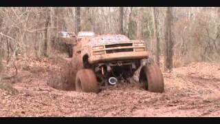 huge mud trucks with big blocks in deep ruts [upl. by Snilloc684]