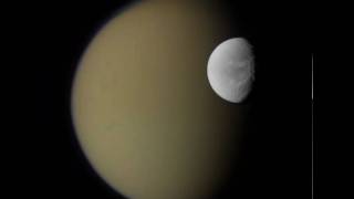 Saturns Moons Dione and Titan from Cassini [upl. by Einttirb]