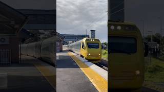 Tilt Train passing Carseldine station with country horn blast [upl. by Lore]