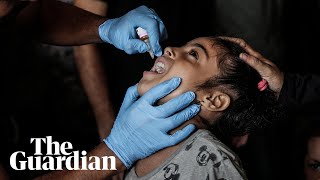 Children receive polio vaccination in Gaza after inoculation campaign begins [upl. by Eirahs]