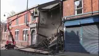 Front Of Building Collapses After Builder Tries To Remove Brick [upl. by George]