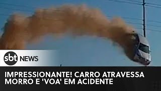 Carro atravessa morro e voa em acidente  SBT News [upl. by Omoj82]