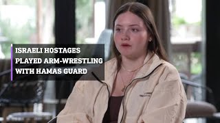 Female Israeli hostages played armwrestling with Hamas guard [upl. by Clarke70]