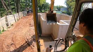 John Deere 190E excavator working on footing drain [upl. by Rolecnahc]