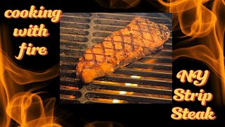 The Ultimate Saltseasoned medium rare NY Strip Recipe steak charcoal grilled [upl. by Ennaeed193]