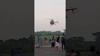 Schweizer S300 low flying helicopter above crowd helicopter aircraft [upl. by Alleroif]