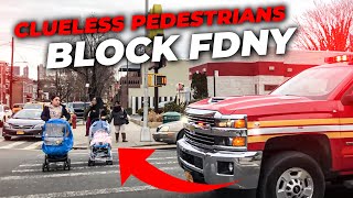 Two idiots dont yield to FDNY Emergency Vehicle amp get scolded by police officers [upl. by Ecnatsnoc]