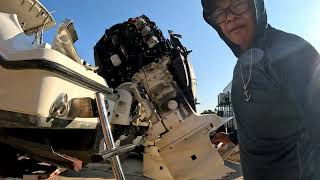 Replace impeller on 225 Evinrude outboard [upl. by Htepsle]