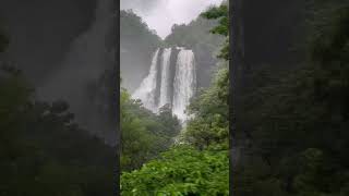 Mandovi express crossing beautiful Ukshi Waterfall [upl. by Pachton]