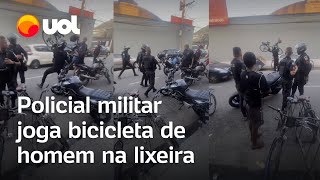 Policial militar joga bicicleta na lixeira e homem revida empurrando moto do PM no chão [upl. by Earleen]