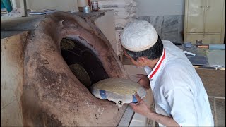 Baking traditional Taftoon bread  persian bread  iranian bread [upl. by Oeniri]