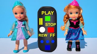 Elsa amp Anna toddlers playing jokes with a remote control [upl. by Teilo]