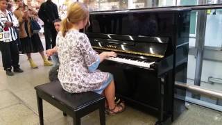 Great reaction at pro pianist playing in St Pancras train station part 2 [upl. by Eiramadnil468]