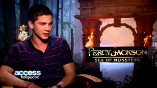 Logan Lerman Reacts To Selena Gomezs Crush Revelation on E Special With Ryan Seacrest [upl. by Everrs]