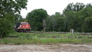 Woodstock Ontario 🇨🇦fast westbound freight train at Carew diamond CN locomotives 3171 2872 [upl. by Frost]