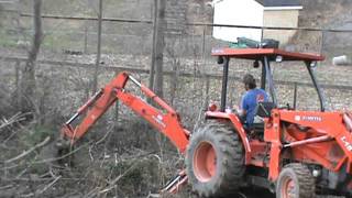 Kubota L48 clearing brush [upl. by Adyaj]