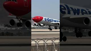 Edelweiss 2M Heavy Airbus A340313 lands on Las Vegas runway 26L  HBJME  planespotting shorts [upl. by Mou]