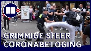 Demonstranten vallen agenten aan bij coronaprotest in Den Haag  NUnl [upl. by Tihor]