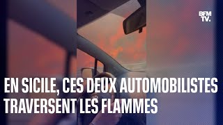 En Sicile ces deux automobilistes traversent les flammes en voiture [upl. by Nairod]