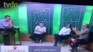 Expresidente do Inter dá soco em jornalista ao vivo em programa de TV [upl. by Ahrat714]