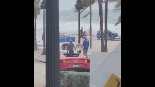 Ferrari Red Coupe Spotted swifting through the beach HOT ITALIAN DRIVE BEACHSIDE [upl. by Nosniv855]