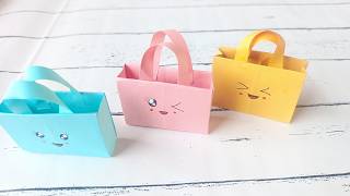 How to make paper bagCute paper bagEasy paper bagEasy paper gift bagPaper handbagOrigami bag [upl. by Anyahs]