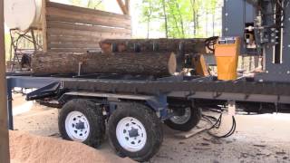 Baker Products 3665D Portable Band Sawmill In action [upl. by Elyrpa]