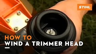 How to Wind a STIHL Trimmer Head  How To [upl. by Babette]