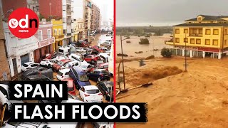 Terrifying Footage Shows Flash Floods in Spain Sweep Away Walls and Cars [upl. by Nertie]