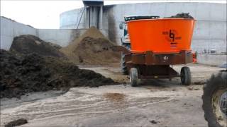 Roto Grind grinding manure mixed with straw [upl. by Belshin]