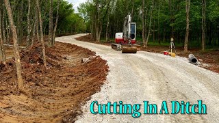 Cutting In A Ditch With The Takeuchi TB260 [upl. by Joelly]