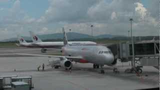 JetStar Asia Airbus A320  Row 13 Exit [upl. by Hcurab]