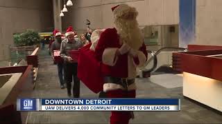 UAW sends message handdelivers 4000 letters to GM via Santa [upl. by Ahsot363]