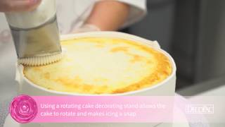 DecoTips How to Base Ice a Cake [upl. by Yelkao]