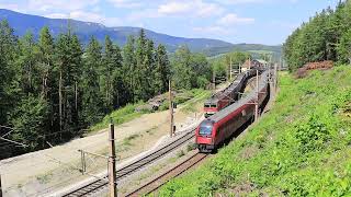 RJ 539 Wien  Villach and a northbound freight train near Eichberg Semmering line [upl. by Nilat913]