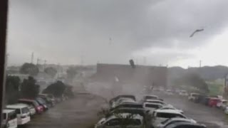 Shocking footage Japan tornado scares schoolchildren damages homes and injures 60 [upl. by Olgnaed225]