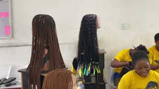 Our talented braiders at work All of our braided lace wigs are handmade with actual human hair [upl. by Iman255]